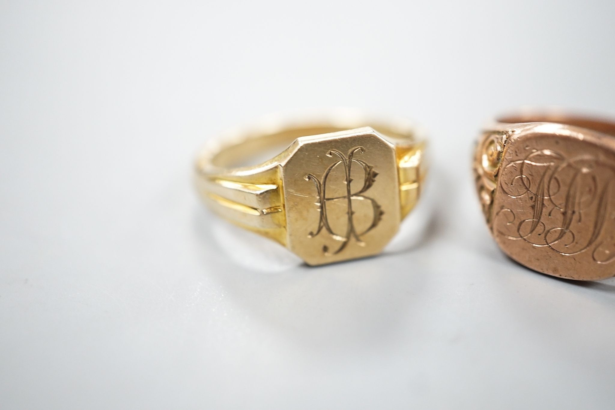 Two 9ct gold signet rings, both with engraved monograms, sizes R/S & S, gross 14.7 grams.